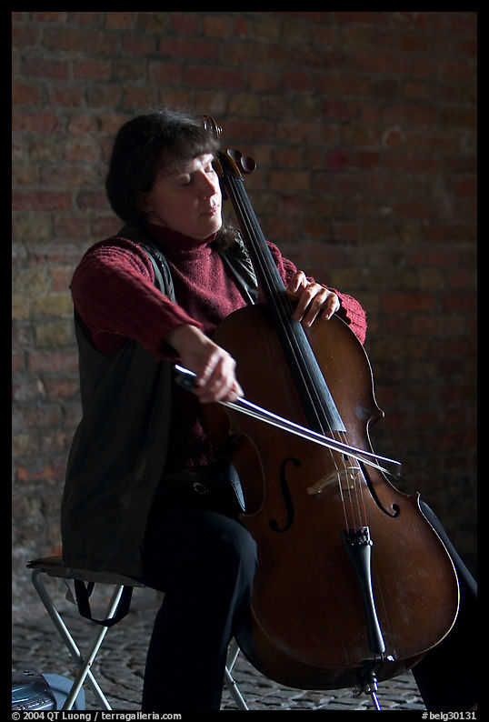 Woman cellist. Bruges, Belgium