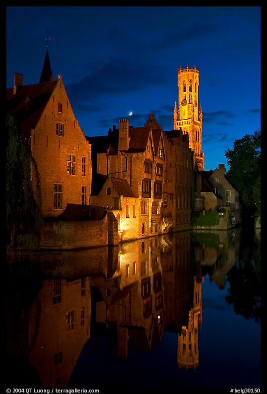 Old houses and beffroi Quai des Rosaires, night. Bruges, Belgium