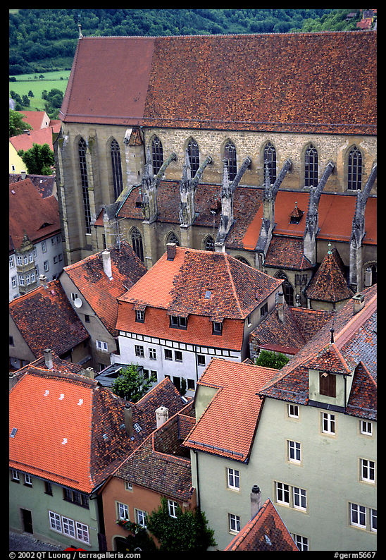 House rooftops and Kirche Sankt-Jakob seen from the Rathaus tower. Rothenburg ob der Tauber, Bavaria, Germany