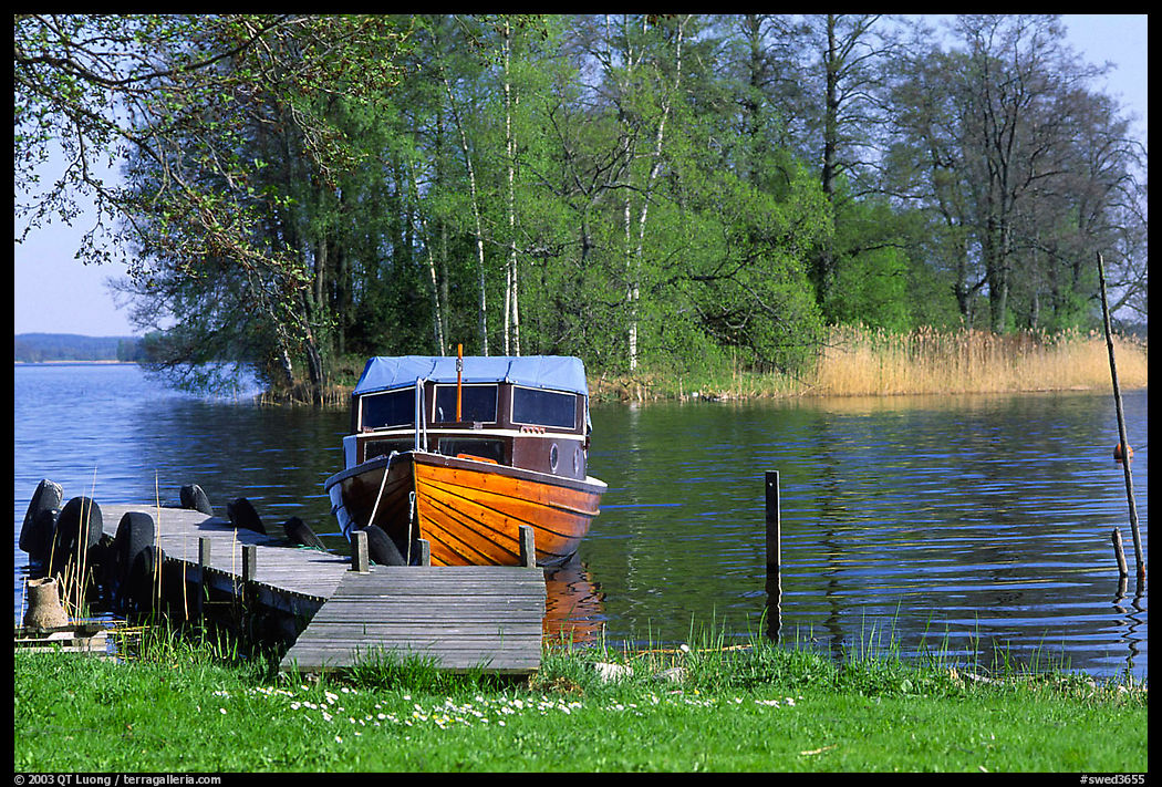 Boat on lakeshore. Central Sweden