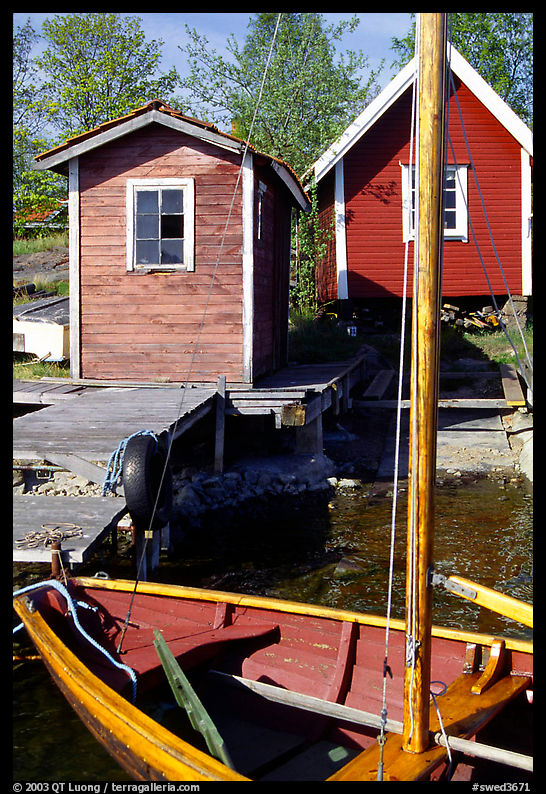Boat and cabins. Gotaland, Sweden