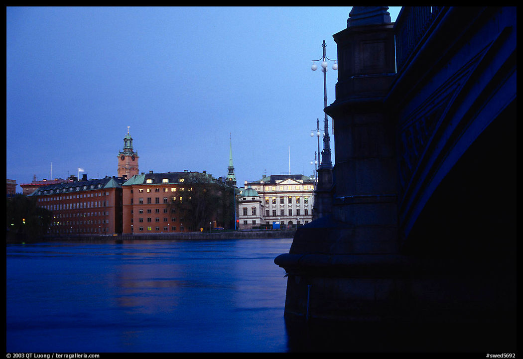Bridge on Riddarfjarden and Gamla Stan, midnight twilight. Stockholm, Sweden
