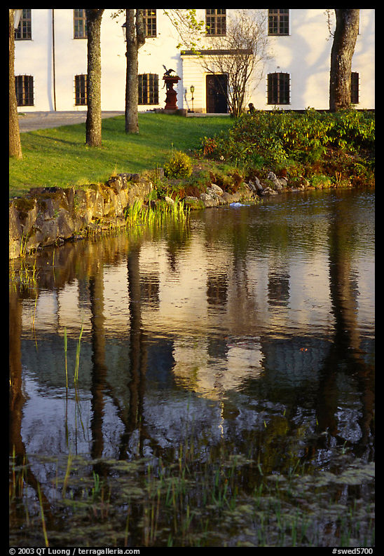 Building reflected in a lake, Skansen. Stockholm, Sweden