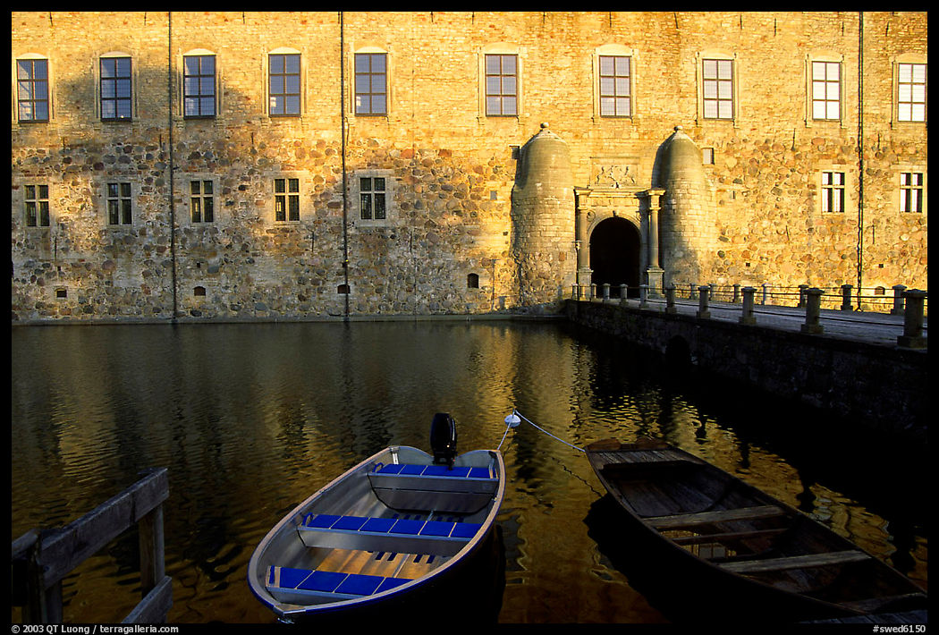 Boat and moat of Vadstena slott. Gotaland, Sweden
