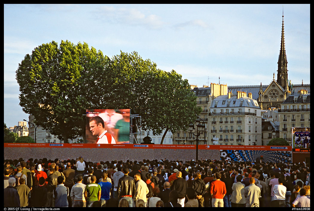 Crowds watch a broadcast of a soccer match near Hotel de Ville. Paris, France
