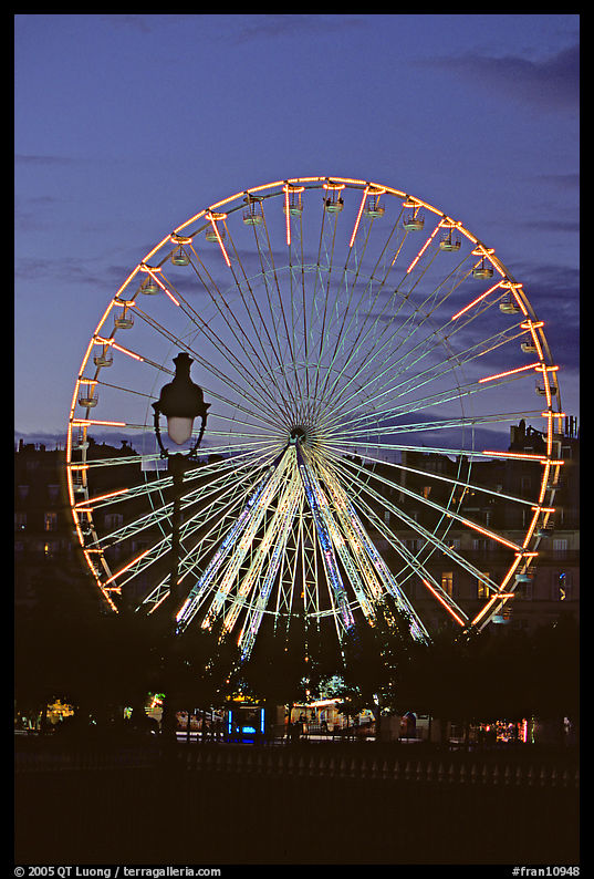 Ferris wheel in the jardin des Tuileries at sunset. Paris, France