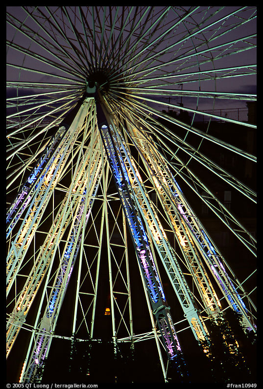 Lighted Ferris wheel in the Tuileries garden. Paris, France