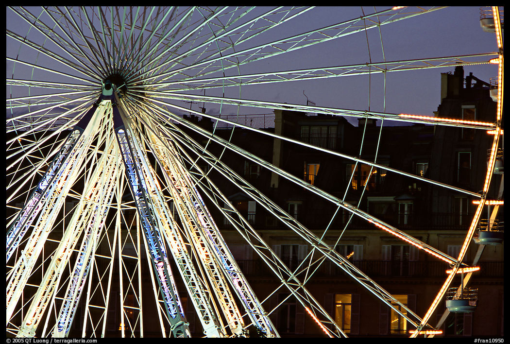 Lighted Ferris wheel in the Tuileries. Paris, France