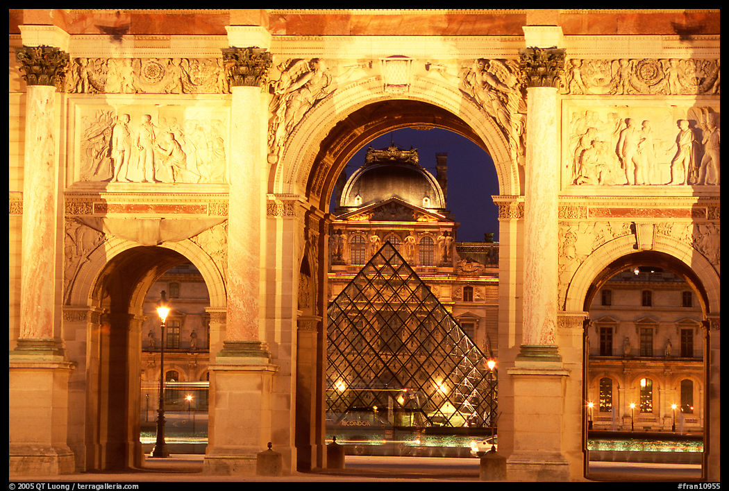 Arche de triomphe du Carousel, Louvre, and Pyramid at night. Paris, France