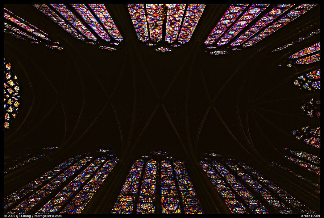 Ceiling and stained glass of Upper Holy Chapel. Paris, France