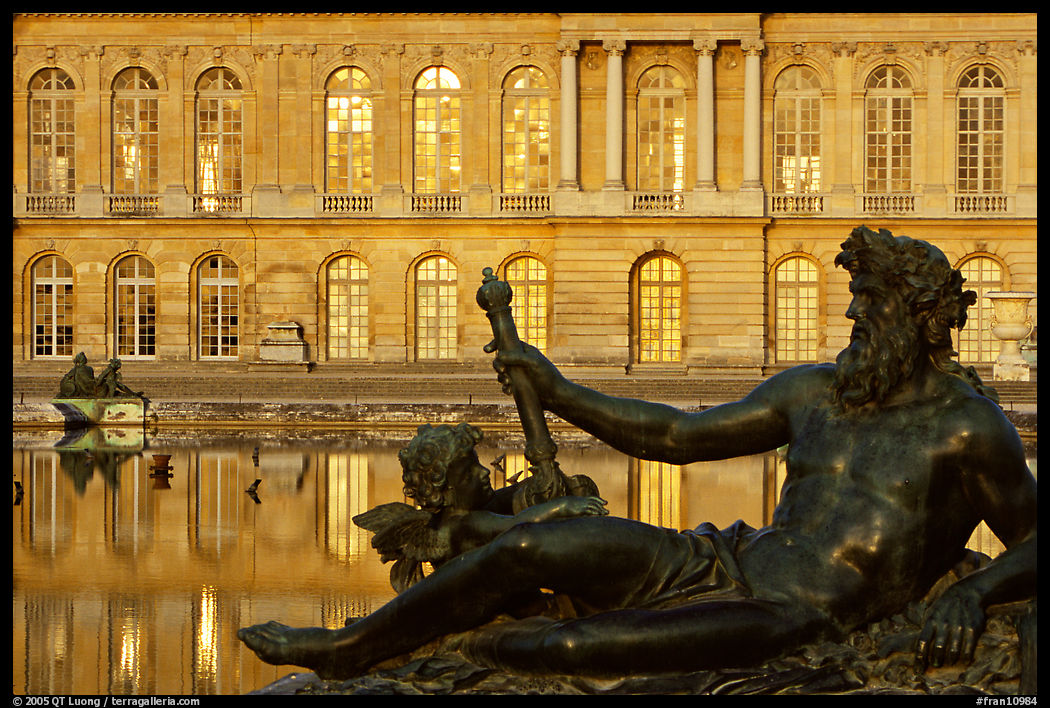 Statue, basin, and facade, late afternoon. France