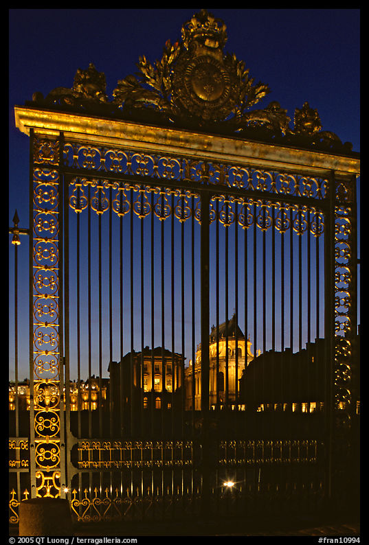 Versailles Palace gates at night. France