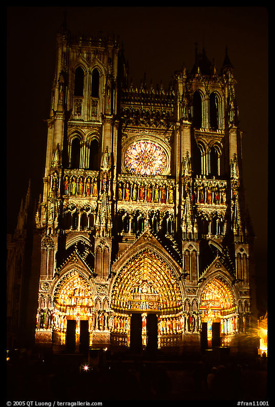 Cathedral facade laser-illuminated at night to recreate original colors, Amiens. France