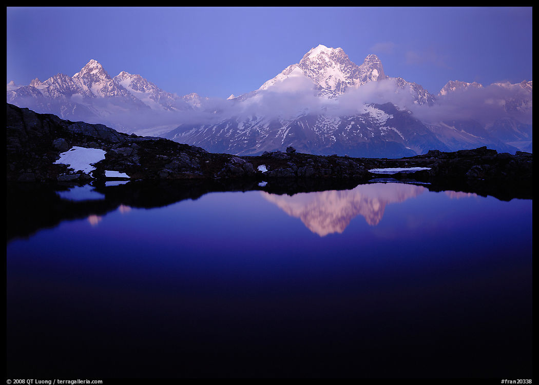 Aiguille Verte reflected in pond at dusk, Chamonix. France