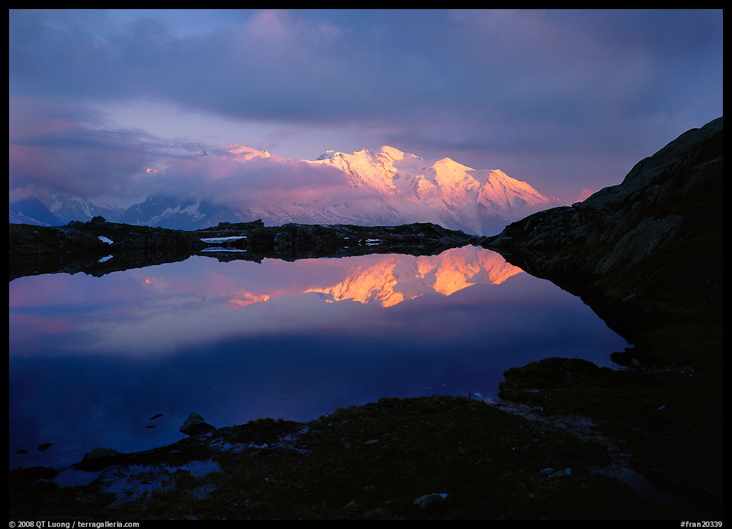 Mont Blanc range reflected in pond at sunset, Chamonix. France