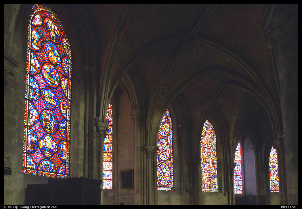 Aisle with Stained glass windows in the Saint-Etienne Cathedral. Bourges, Berry, France