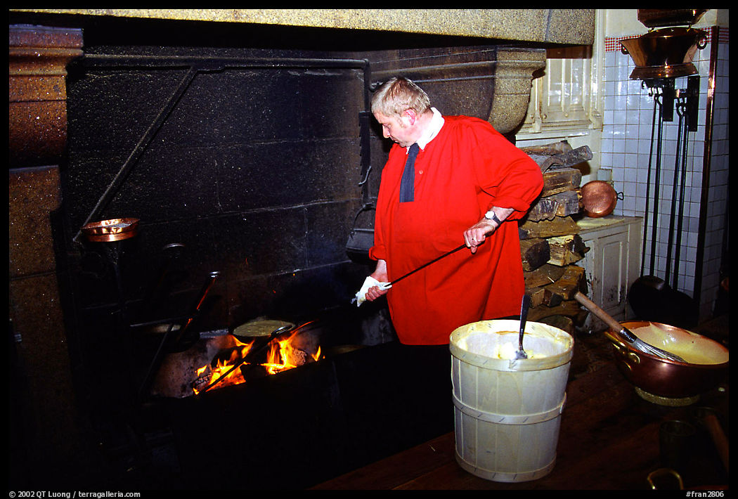 Baking the famous Omelette de la mere Poularde at the eponymous restaurant. Mont Saint-Michel, Brittany, France