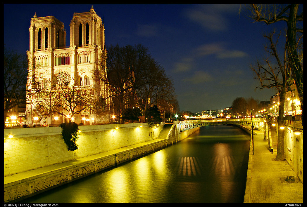 Notre Dame and Seine river at night. Paris, France