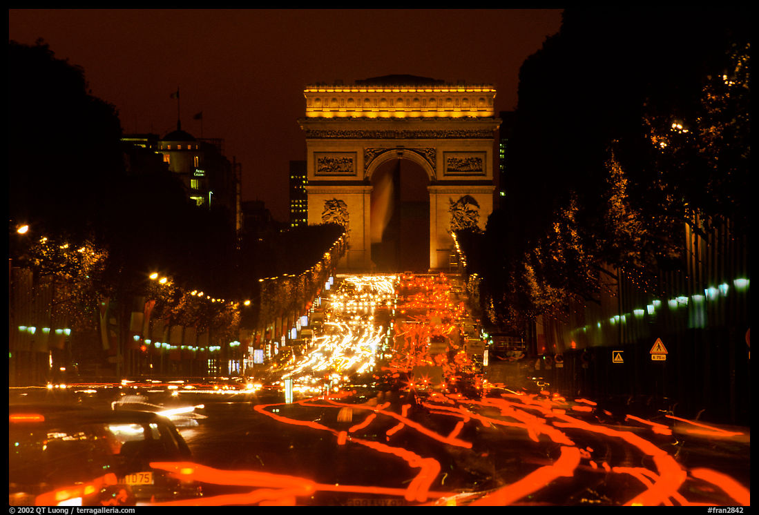 Arc de Triomphe and Champs Elysees at night. Paris, France