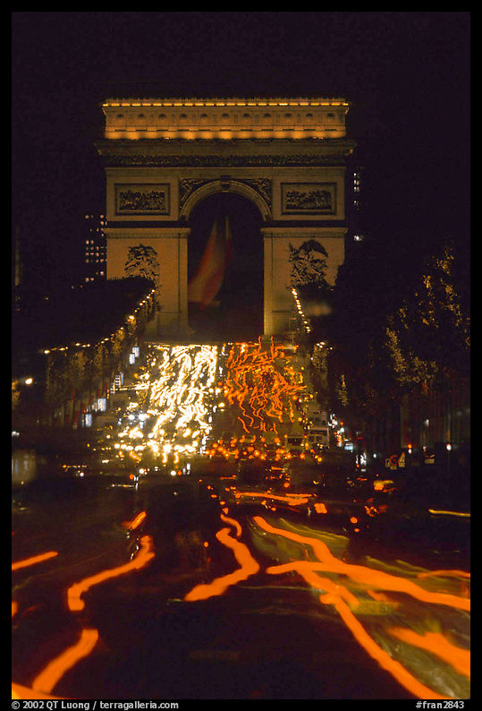 Arc de Triomphe and Champs Elysees at night. Paris, France