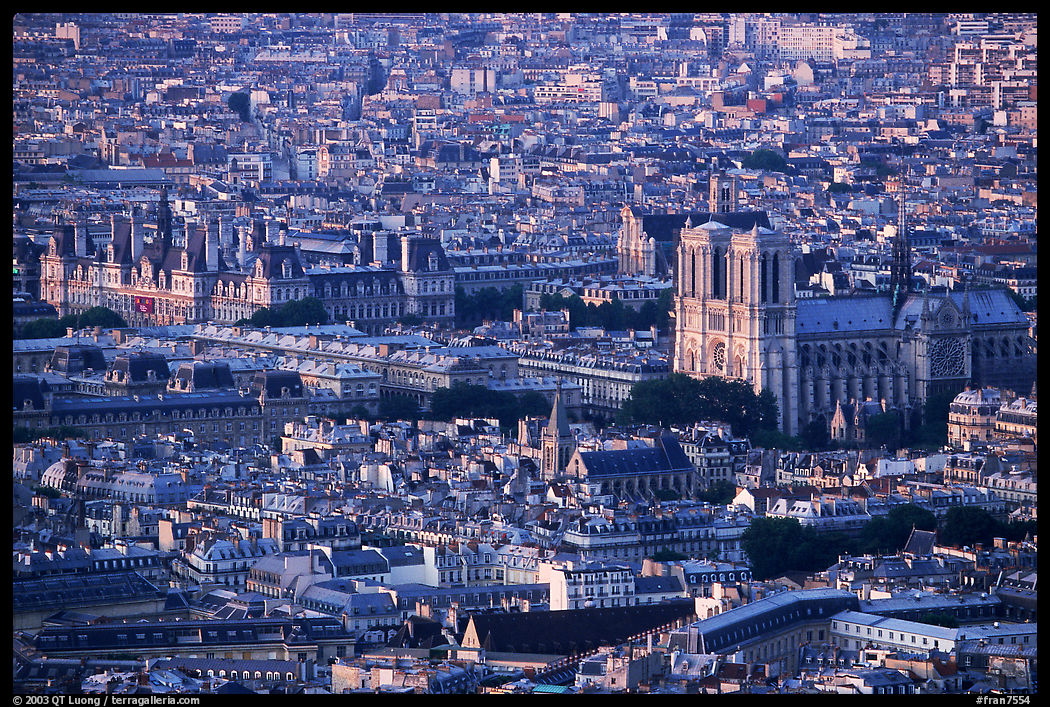 Hotel de Ville (City Hall) and Notre Dame seen from the Montparnasse Tower, sunset. Paris, France
