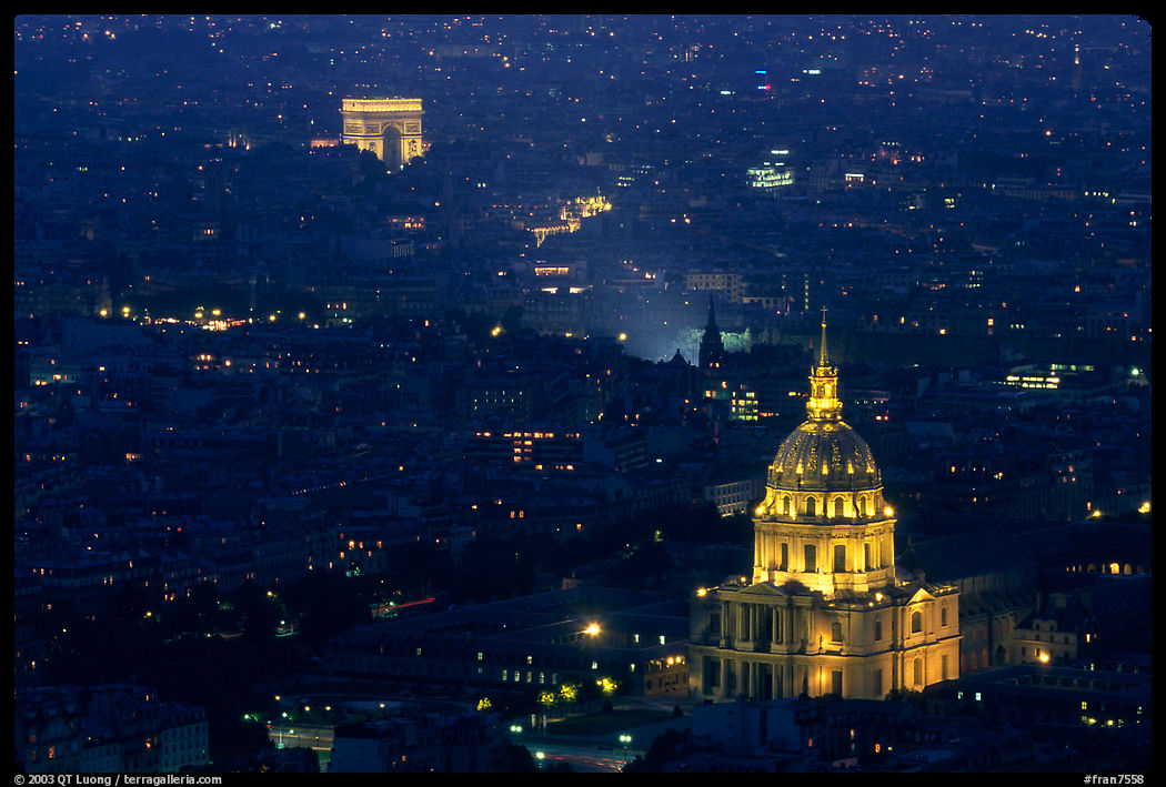 Arc de Triomphe and Invalides seen from the Montparnasse Tower by night. Paris, France