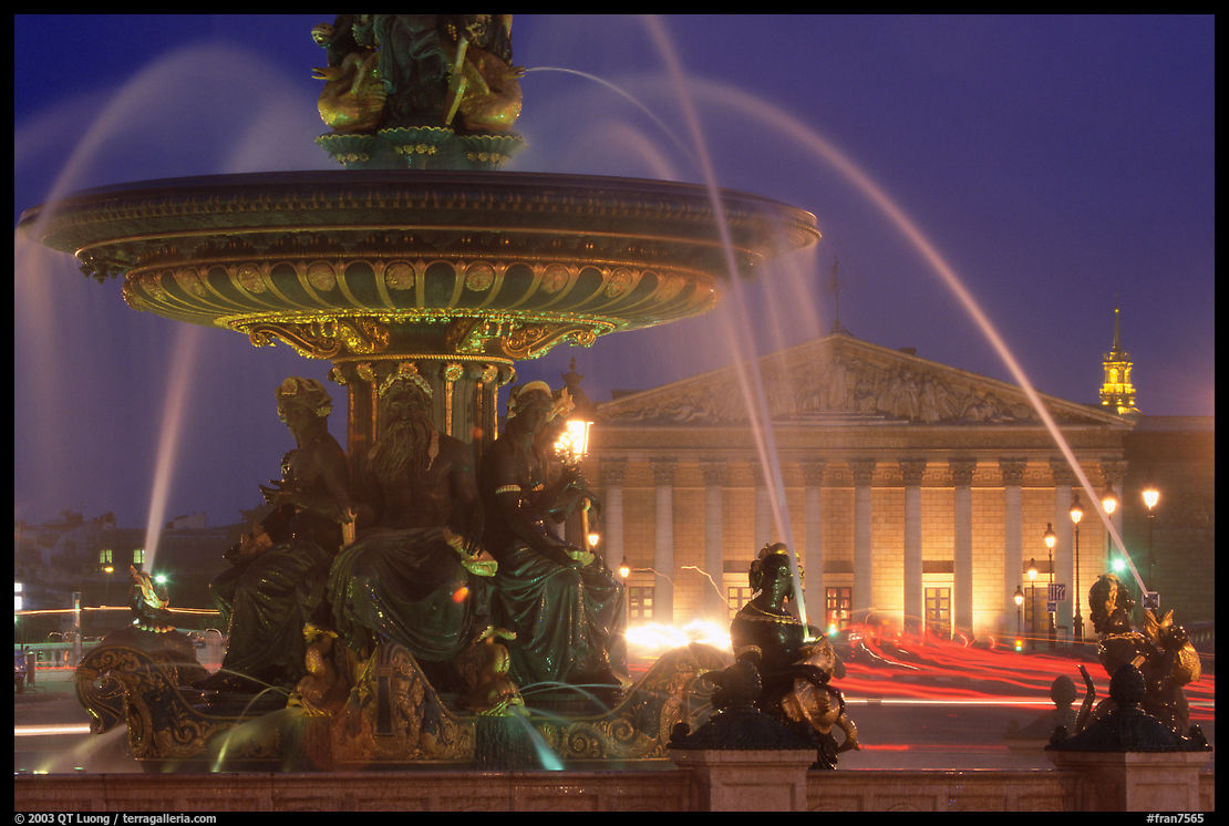 Fountain on Place de la Concorde and Assemblee Nationale by night. Paris, France