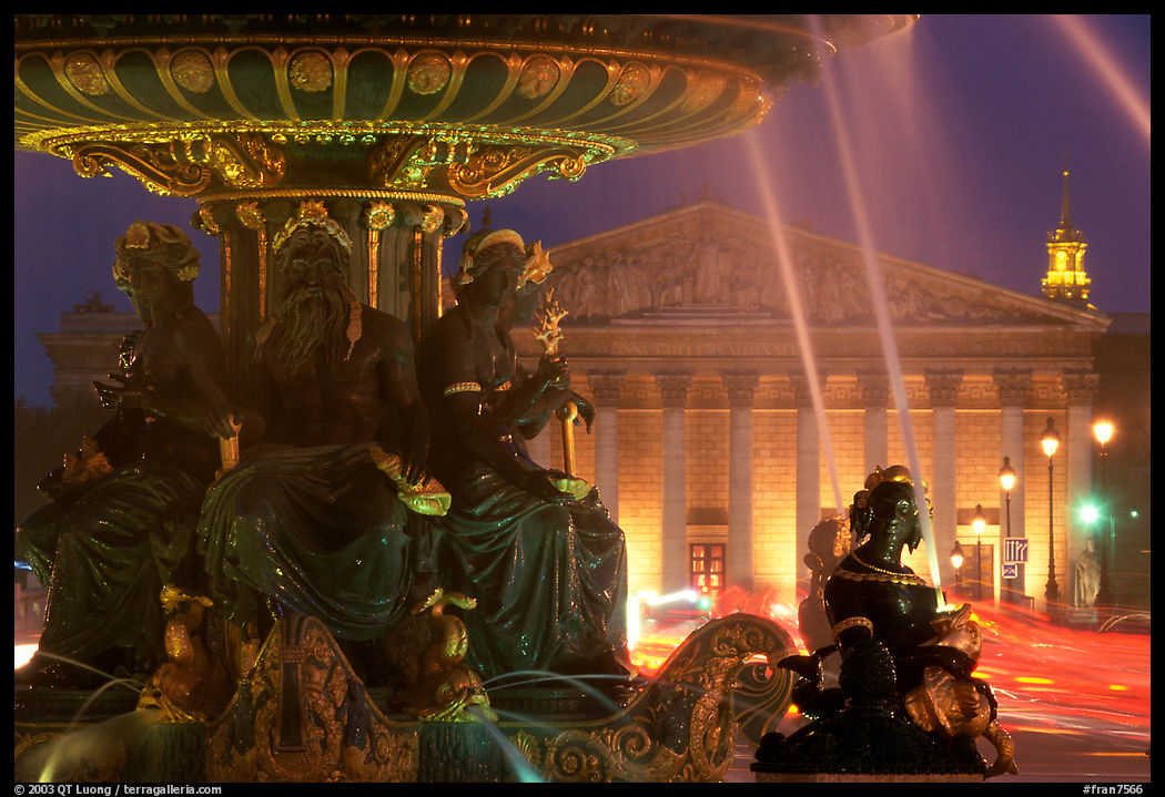 Fountain on Place de la Concorde and Assemblee Nationale by night. Paris, France