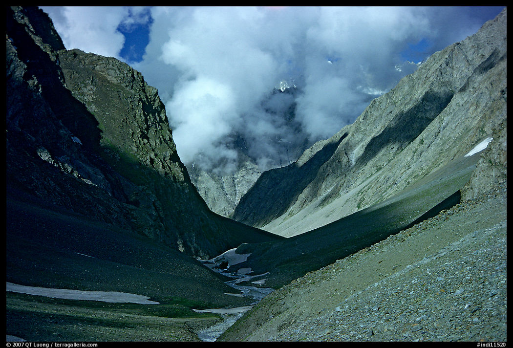 Valley with high cliffs and clouds, Zanskar, Jammu and Kashmir. India