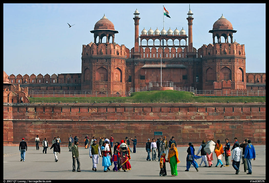 Visitors walking on esplanade in front of the Lahore Gate. New Delhi, India