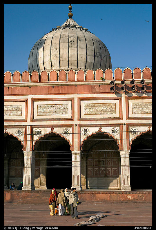 Group of people walking out of prayer hall. New Delhi, India