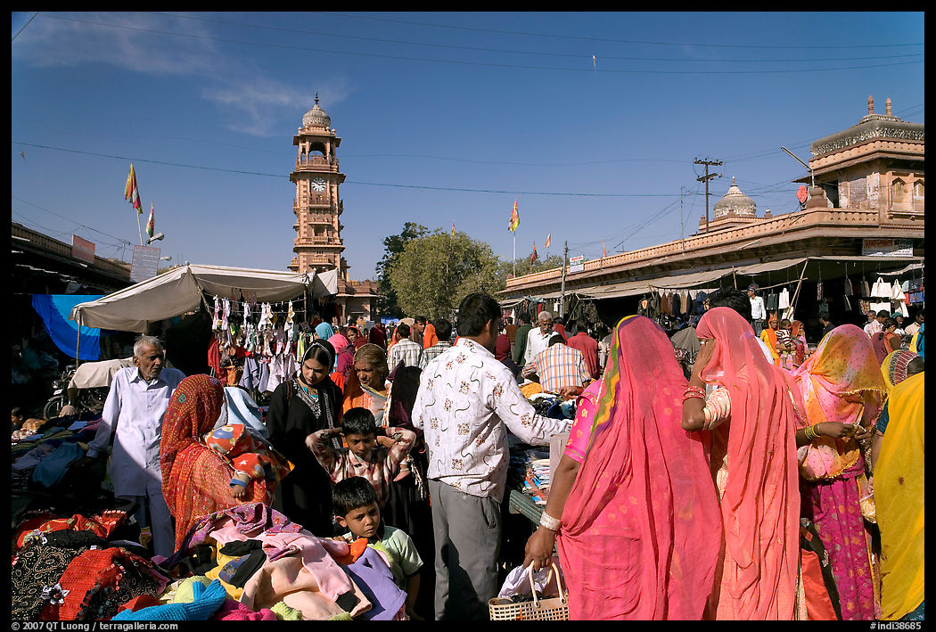 Sadar Market, with women in colorful sari and clock tower. Jodhpur, Rajasthan, India