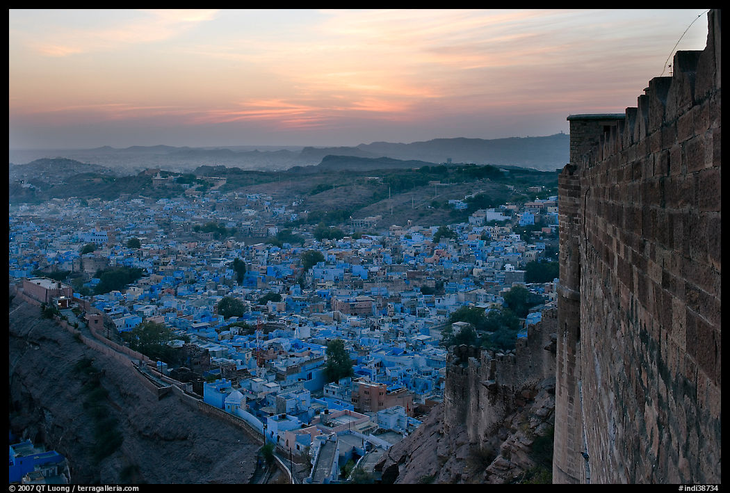 Mehrangarh Fort walls, and old city  blue houses, sunset. Jodhpur, Rajasthan, India