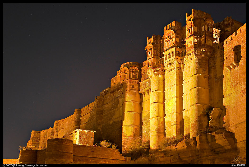 Towers and 36m high walls of Mehrangarh Fort by night. Jodhpur, Rajasthan, India