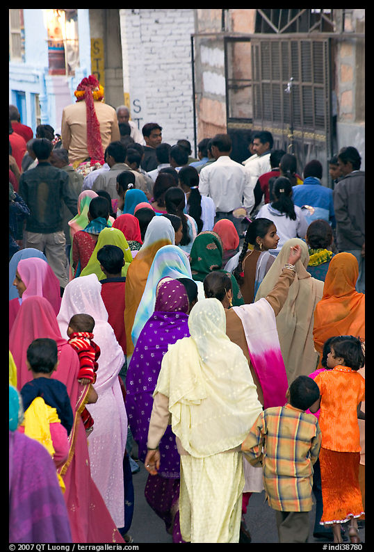 Women following groom during wedding. Jodhpur, Rajasthan, India