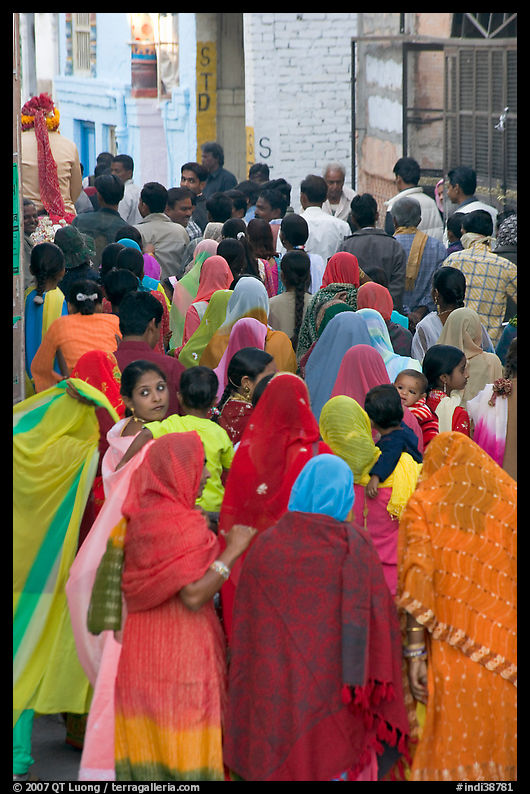Narrow street filled by wedding procession. Jodhpur, Rajasthan, India