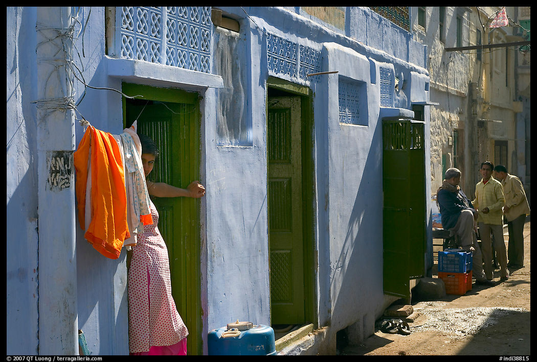 Sunlit street with blue house. Jodhpur, Rajasthan, India