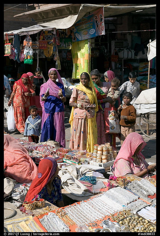Women looking at jewelry stand in Sardar market. Jodhpur, Rajasthan, India