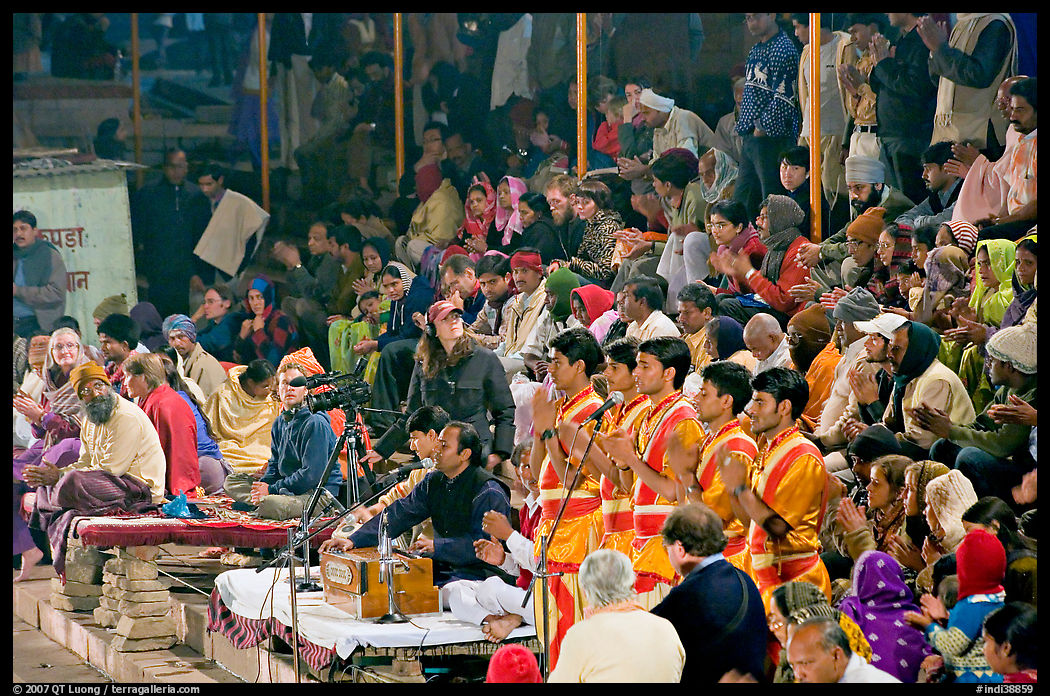 Brahmans standing amongst crowd at the begining of evening puja. Varanasi, Uttar Pradesh, India
