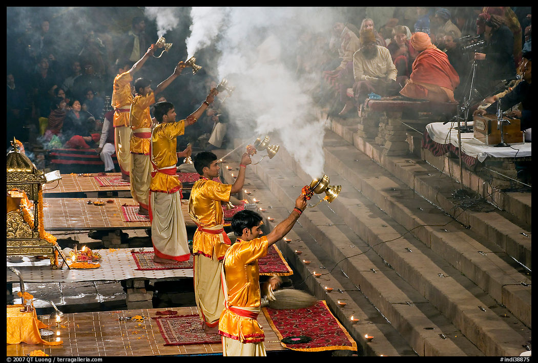 Hindu holy men performing religious arti ceremony. Varanasi, Uttar Pradesh, India
