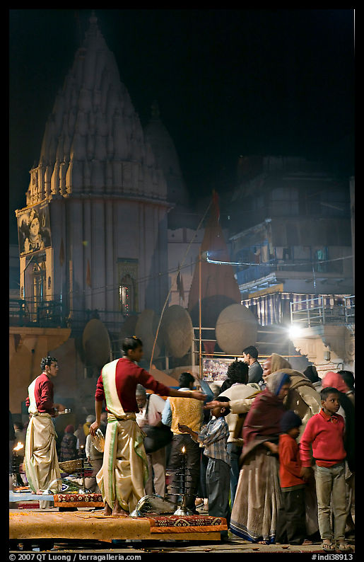Brahmans giving blessings after evening arti ceremony. Varanasi, Uttar Pradesh, India
