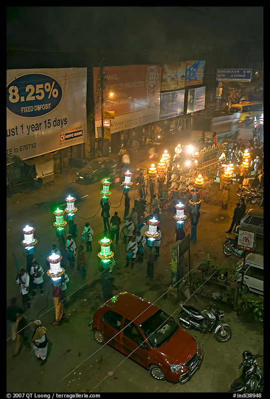 Street and wedding procession by night from above. Varanasi, Uttar Pradesh, India