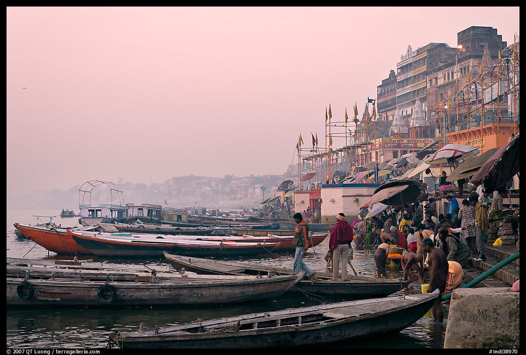 Boats and ghat at sunrise. Varanasi, Uttar Pradesh, India