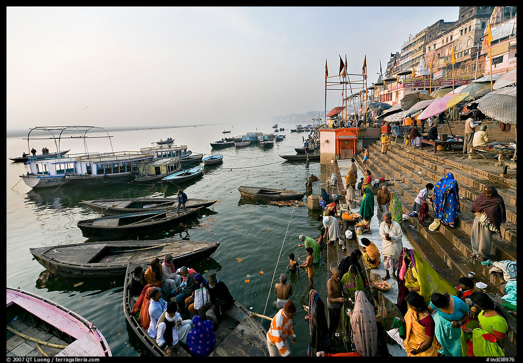 Activity on the steps of Dasaswamedh Ghat, early morning. Varanasi, Uttar Pradesh, India