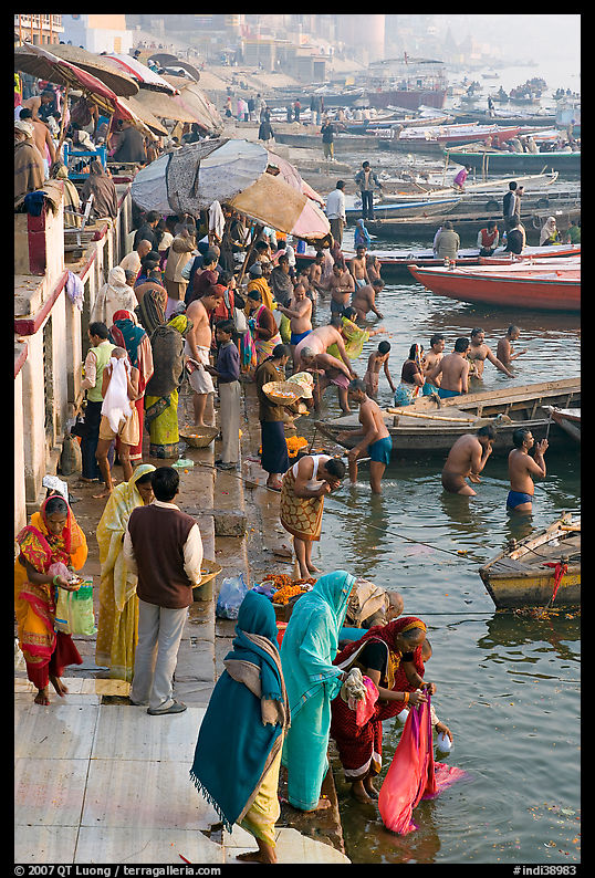 Gathering on the banks of Ganges River, sunrise. Varanasi, Uttar Pradesh, India