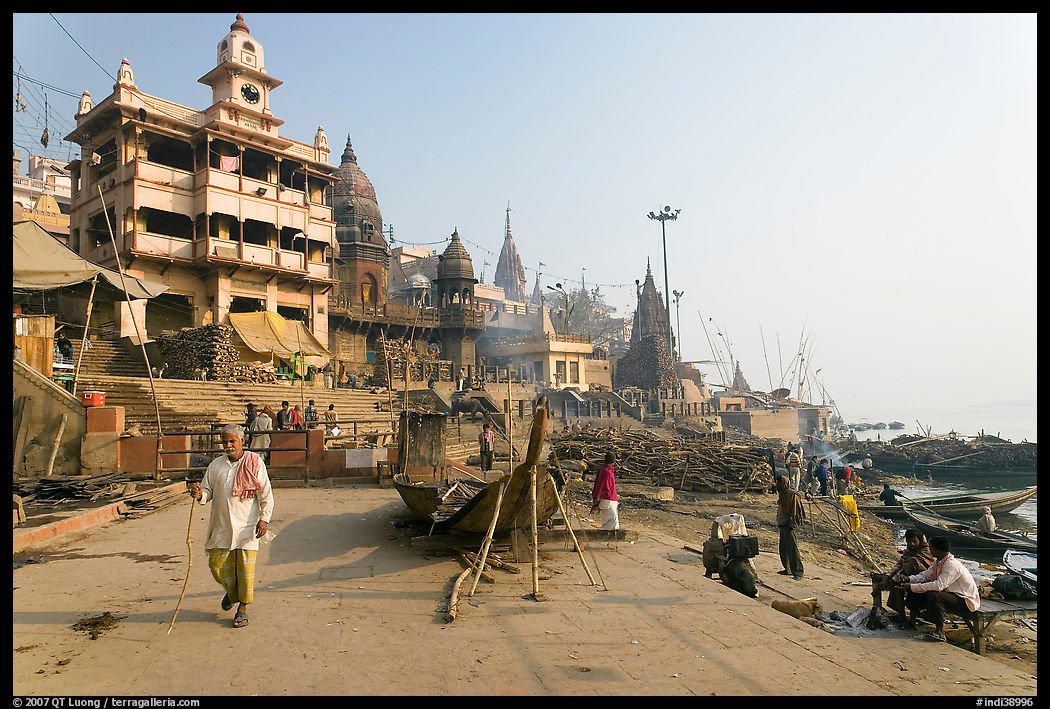 Manikarnika Ghat, with piles of wood used for cremation. Varanasi, Uttar Pradesh, India