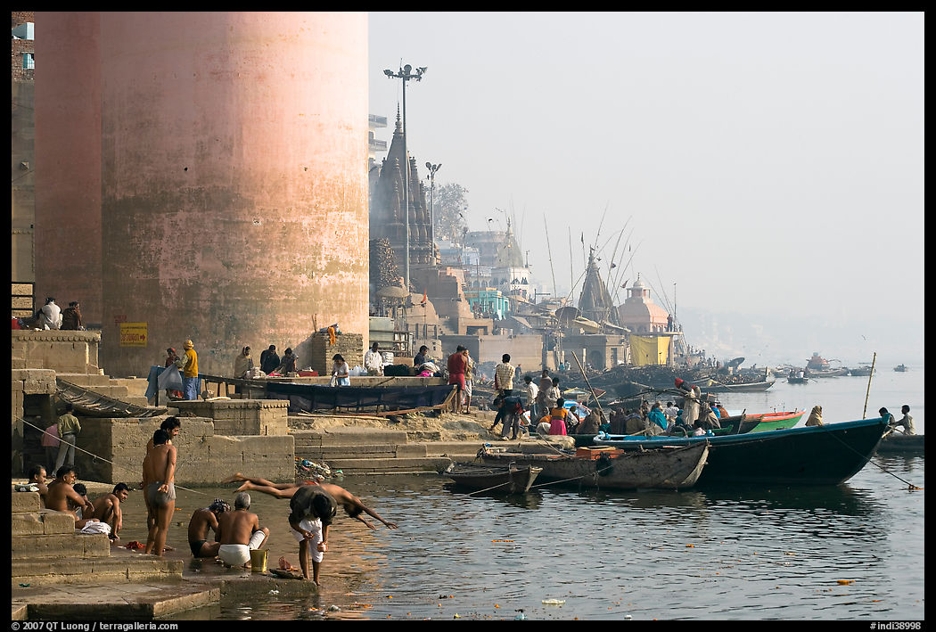 Ganges riverbank with men bathing. Varanasi, Uttar Pradesh, India