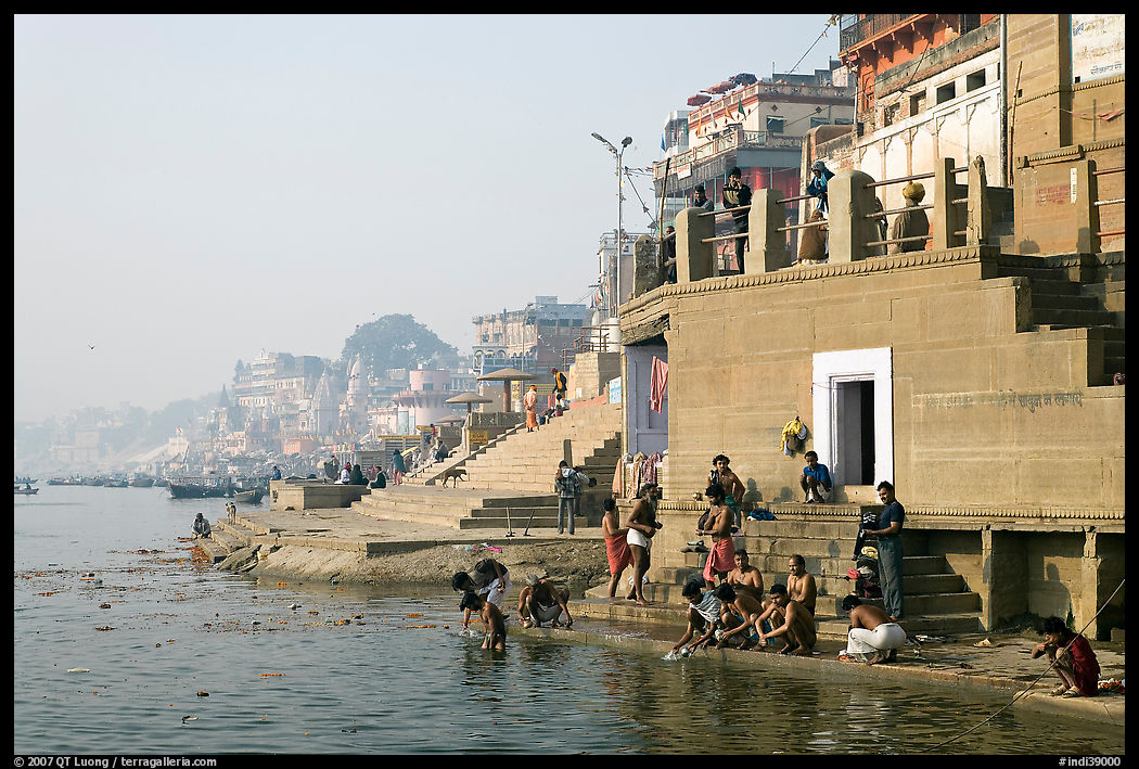 Men dipping in Ganga River at Meer Ghat. Varanasi, Uttar Pradesh, India