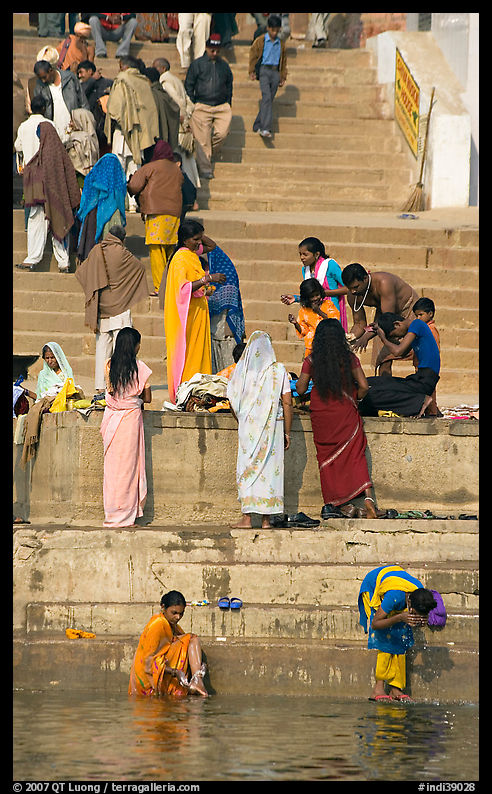 Women rinsing in river Ganges water. Varanasi, Uttar Pradesh, India