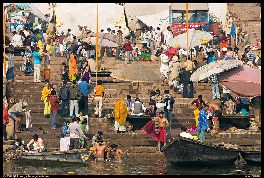 Ganga riverside activity on steps of Dasaswamedh Ghat. Varanasi, Uttar Pradesh, India